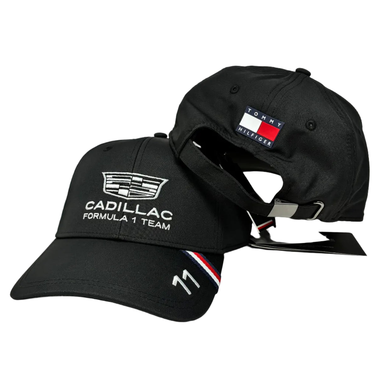 Two black baseball caps shown on a white background. The front cap features the Cadillac Formula 1 Team logo in white, while the rear cap shows a Tommy Hilfiger flag patch on the back.